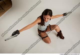 11 Shrima Kneeling Pose With Guns